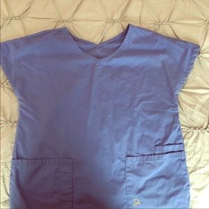 Jaanuu Peplum Scrub Top